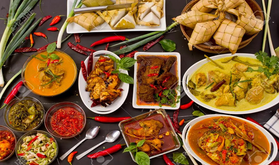 A table full of colorful indonesian dishes