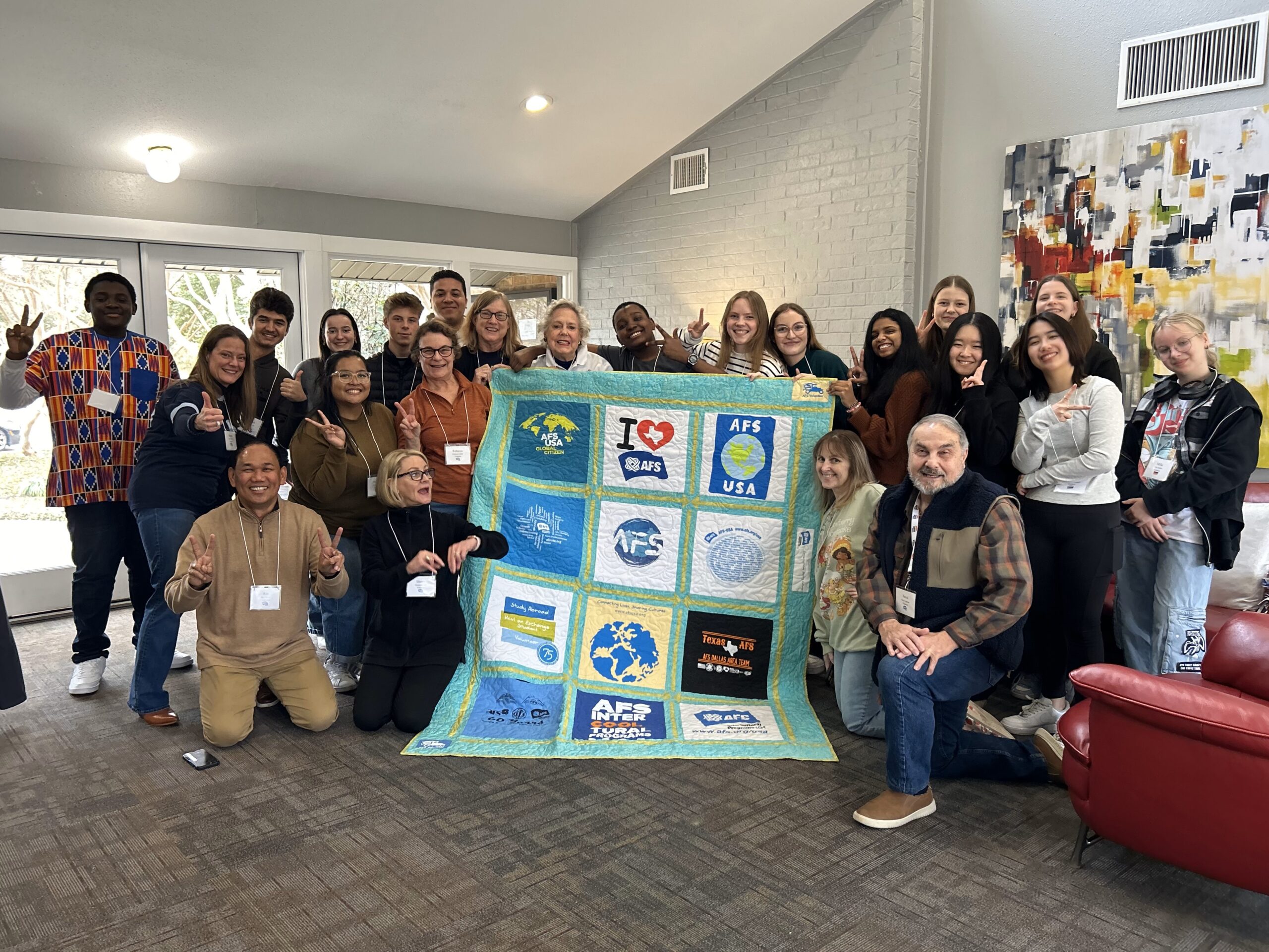 Dallas area team celebrating Donna's contributions with an AFS tshirt quilt